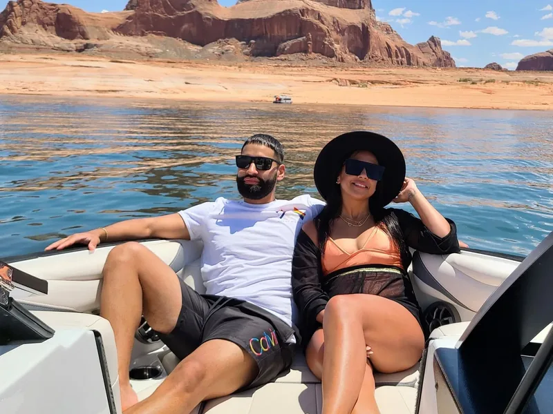 Photo boat on Lake Powell approaching Antelope Canyon's outer cliffs